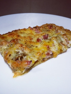 Una foto de Pizza carbonara con base de quinoa