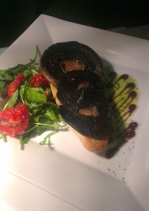 A picture of Bruschetta of mushrooms & garlic.