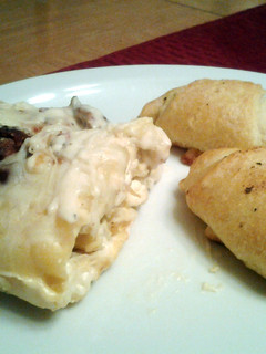 A picture of Chicken and bacon lasagna roll ups.