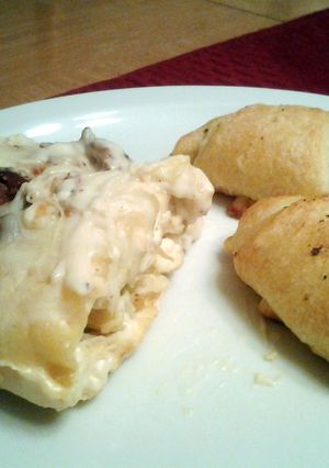 A picture of Chicken and bacon lasagna roll ups.
