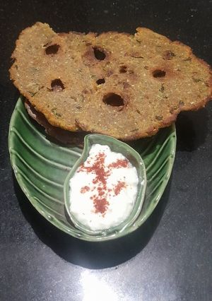 A picture of Multigrain Atta Brinjal & Curd Thalipith.