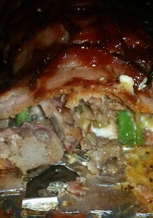A picture of Pulled Pork Bacon Bomb.