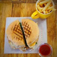 A picture of Potato Burger with French Fries.