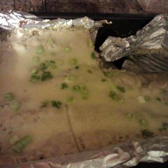 A picture of creamy green enchiladas.
