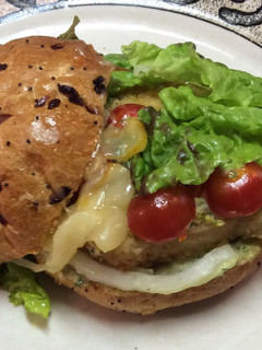 A picture of Chicken Schnitzel On Roll With Basil Aioli (mayo).