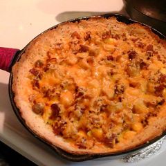 A picture of Deep dish breakfast pizza.
