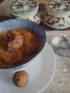 A picture of #BCR#Raw banana kofta in caramelized onion gravy.