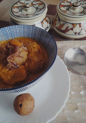 A picture of #BCR#Raw banana kofta in caramelized onion gravy.