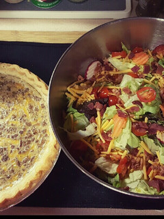 A picture of Cheesy Ranch Beef Pie, with Salad.