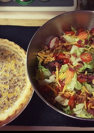 A picture of Cheesy Ranch Beef Pie, with Salad.