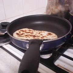 A picture of Naturally Leavened Naan made in a Frying Pan.