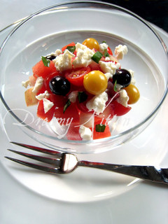 A picture of Watermelon, Peach, Tomato, and Feta Cheese Salad.