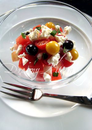 A picture of Watermelon, Peach, Tomato, and Feta Cheese Salad.