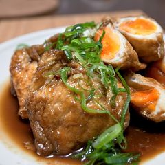 A picture of Braised Aburaage 'Kinchaku' Pouches Stuffed with Eggs.