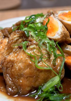 A picture of Braised Aburaage 'Kinchaku' Pouches Stuffed with Eggs.