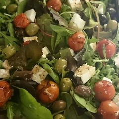 A picture of Roasted cherry tomato, feta and mixed olive salad.