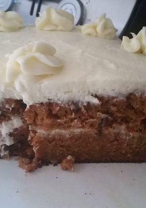 A picture of Carrot Cake with cream cheese frosting.