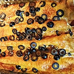 A picture of Chicken Tinga Enchiladas.