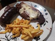 Una foto de morcilla sarten