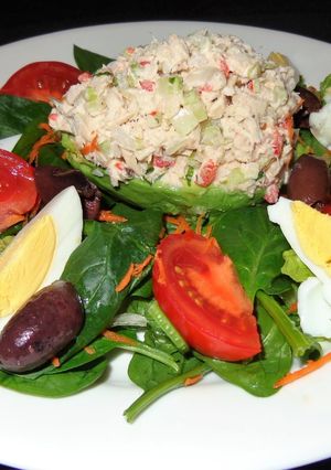 A picture of Albacore salad stuffed avocados.