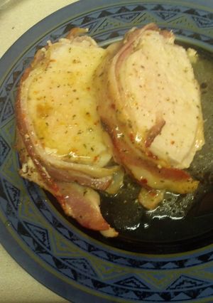A picture of Bacon wrapped garlic and herb pork loin.