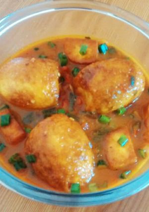 A picture of Egg Curry with Paneer.