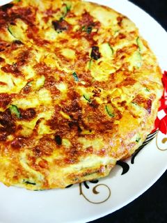 Una foto de Tortilla tres hortalizas