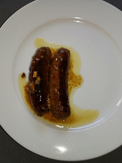 Una foto de Chorizos criollos al vino