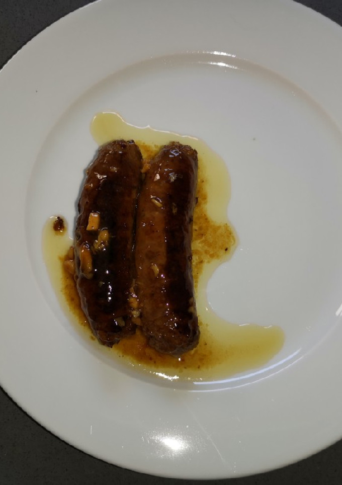 Una foto de Chorizos criollos al vino