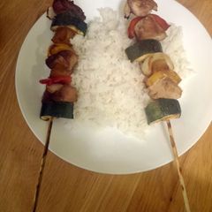 A picture of pineapple teriyaki chicken shish kabobs.