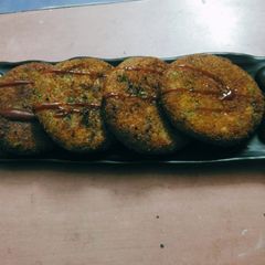 A picture of Fried Aloo Tikki.