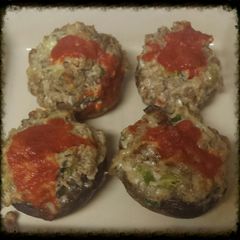 Sausage stuffed mushrooms with sriracha A picture of Sausage stuffed mushrooms with sriracha.