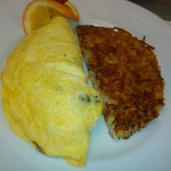 A picture of Mushrooms and onions omelette.