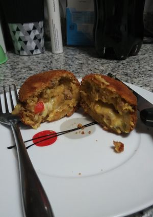 Una foto de Albóndigas vs patata rellena