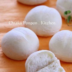 A picture of White Bread Rolls of Happiness Using Fresh Cream.
