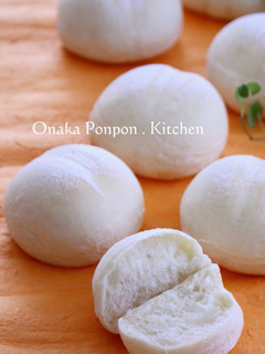 A picture of White Bread Rolls of Happiness Using Fresh Cream.