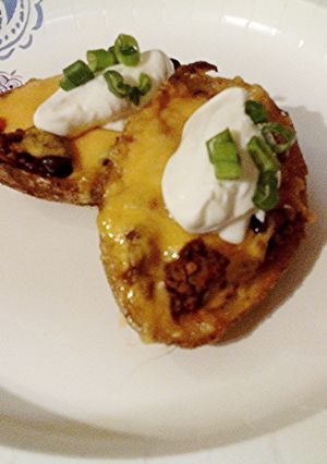 A picture of Chili Cheese Potato Skins.