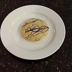 A picture of White Chocolate Cookies with a Cookies and Cream Center.