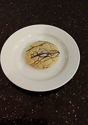 A picture of White Chocolate Cookies with a Cookies and Cream Center.