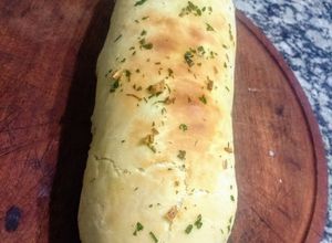 Una foto de Pan casero relleno de jamón y queso