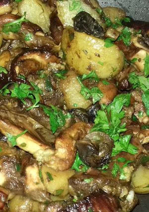 Une photo de Poêlée de cèpes aux escargots