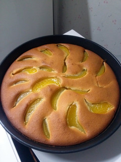 A picture of pie with canned peaches.