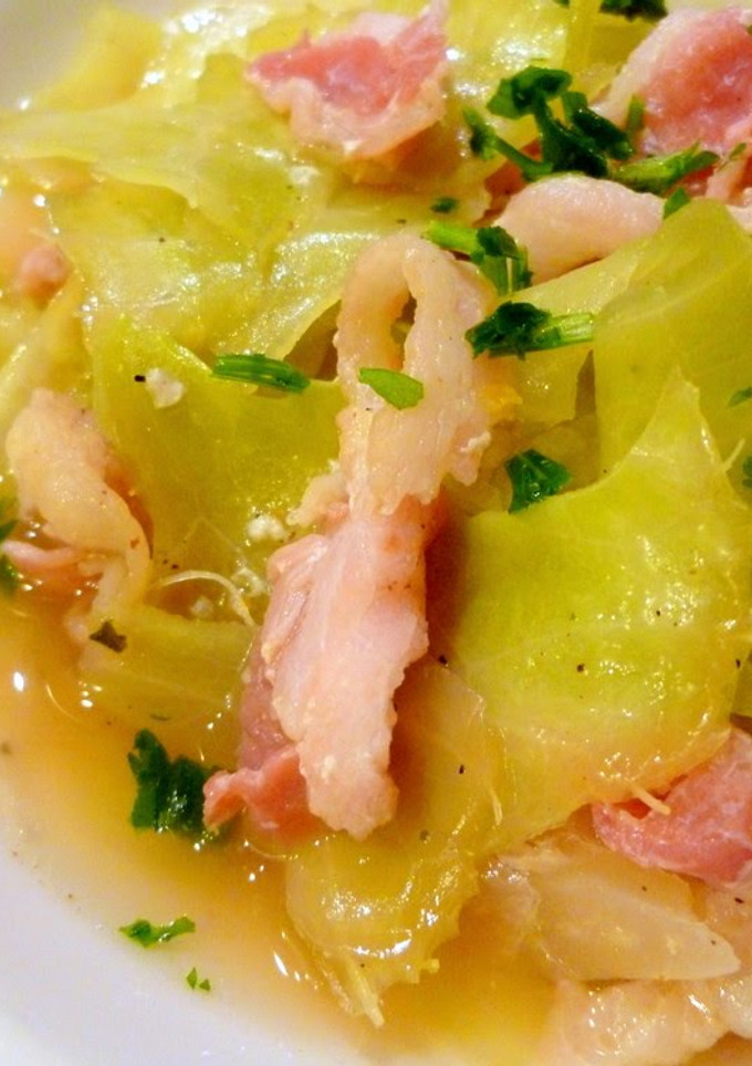 A picture of Steamed Cabbage, Onion, and Bacon in Consommé.