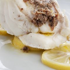 A picture of Thermomix Lemon Cod with anchovies.