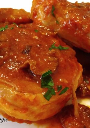 Una foto de Ossobuco con setas