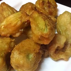 A picture of Stuffed Zucchini Blossoms.