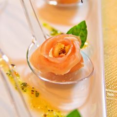 A picture of Flower Shaped Appetizers! Easy Cured Ham and Cream Cheese Roses.