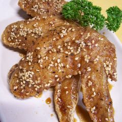 A picture of Deep-fried Chicken Wings with Sweet and Savoury Soy Sauce Glaze.