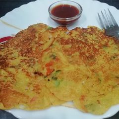 Vegetable Oats Uttapam A picture of Vegetable Oats Uttapam.
