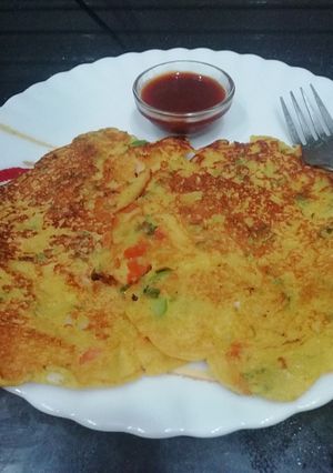 A picture of Vegetable Oats Uttapam.